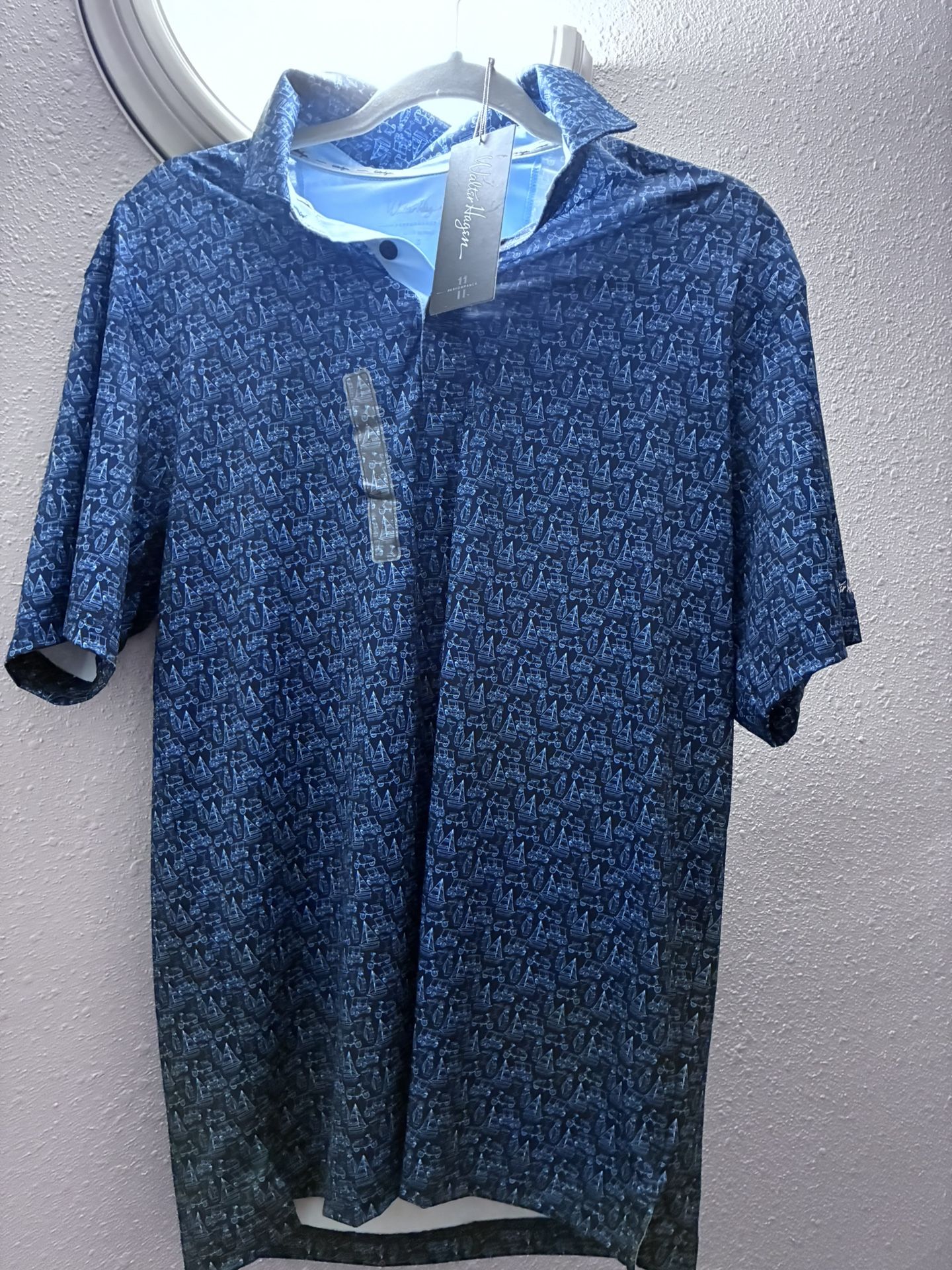 The shirt is a Walter Hagen Men's Performance 11 Naples Printed Short Sleeve Golf Polo.