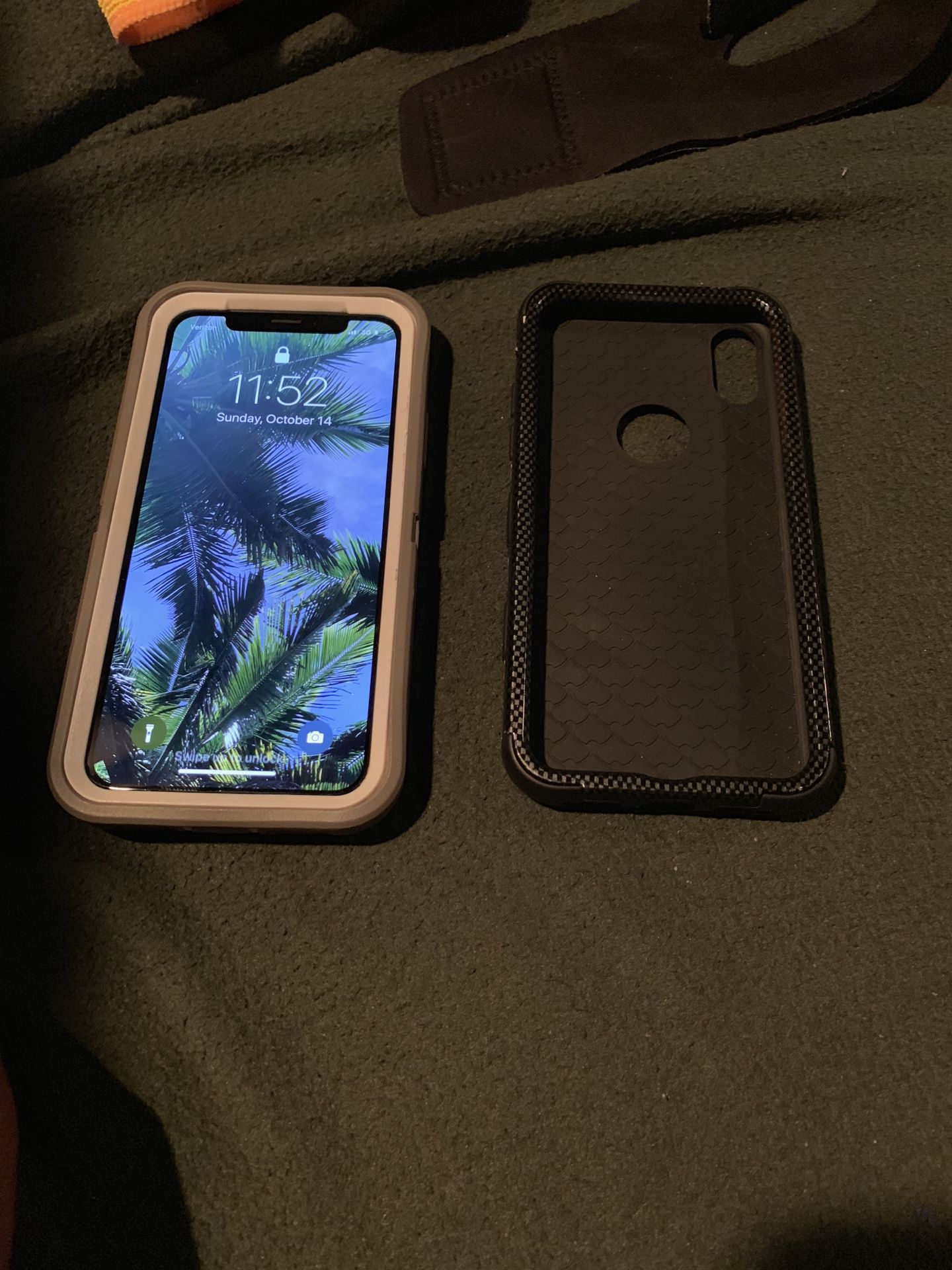 Unlocked iPhone X with 4 cases.