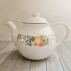 Corelle Coordinates Stoneware Tea Kettle White with Fruit and Berries Motif Design and Matching Lid.

Pre-owned in excellent clean condition.  No chip