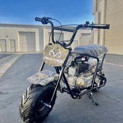 Realtree  Gas Powered 105cc Camo Power Ride-On Mini Bike top speed about 28mph, mix weight 180lb