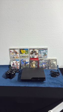 Play Station 3 with cords and 9 games.