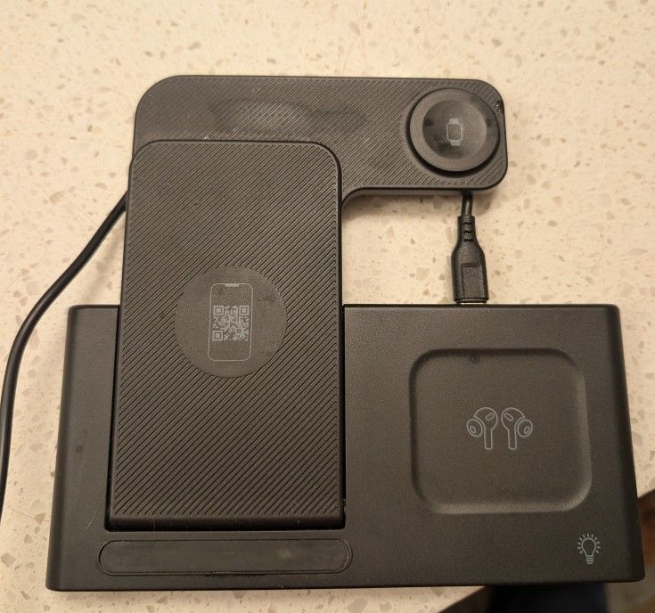 I Phone Charger And Apple Watch Charger And Headphones Charging