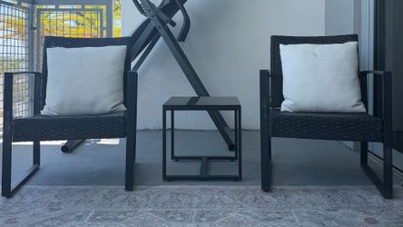 Set of two chairs and coffee table