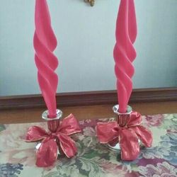 silver plate candlesticks with candles