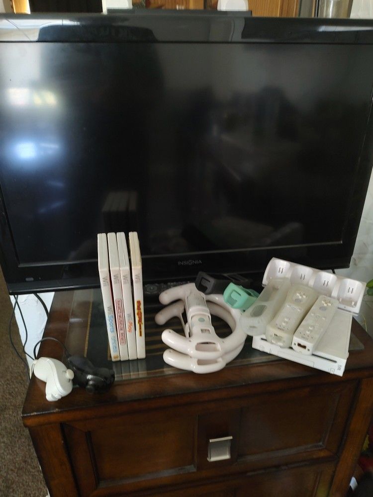 Wii And TV, Games , Charger, Remotes, Jelly Covers , Driving Console,