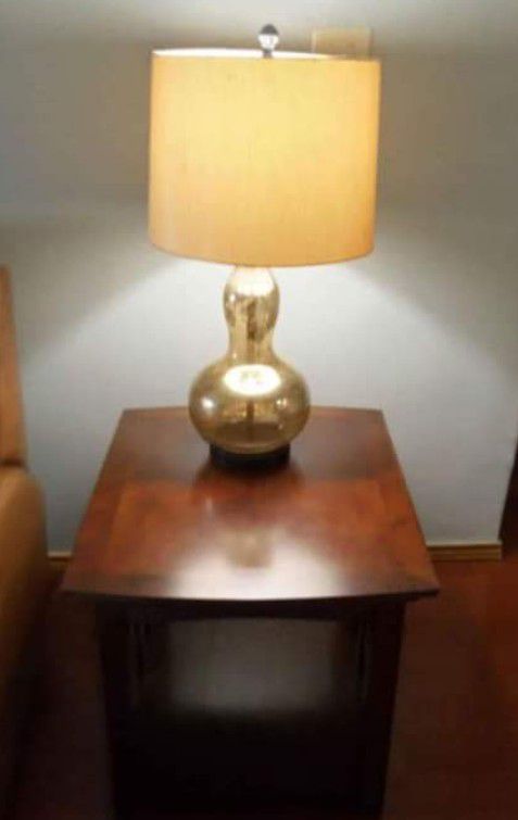 End Table With Gold Lamp