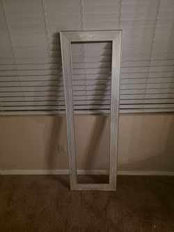 White frame with gold striping