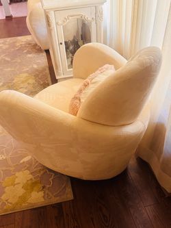 Cream Upholstered Swivel Accent Chair