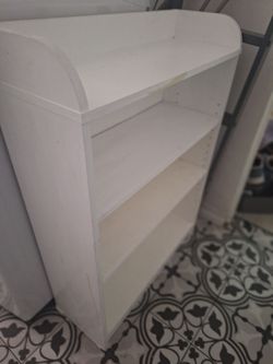 2 white shelves