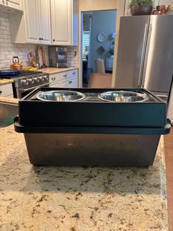 Dog food container with bowls.