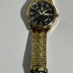 Men watch. gold color   $45