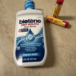 Biotene Dry Mouth Oral Rinse (8 FI Oz) plus two Carmex Classic Lip Balm 