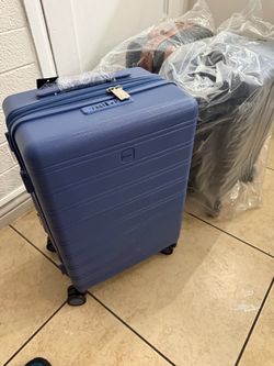 NEW carry on luggage