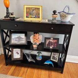 2 black matching tables