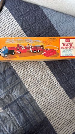 Sears Battery-Powered Mini-Car Transporter Toy
