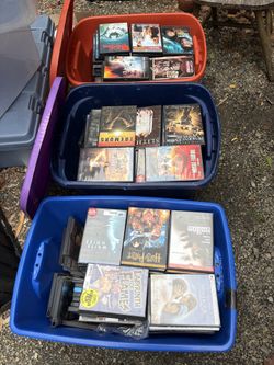 6 plastic tubs of DVDs choose one tub for $30
