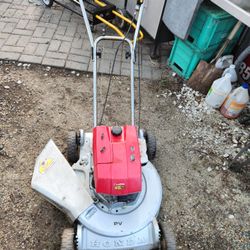 Push lawnmower.  Honda