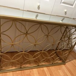Gold glass console table  47L  X  15W  X  32H