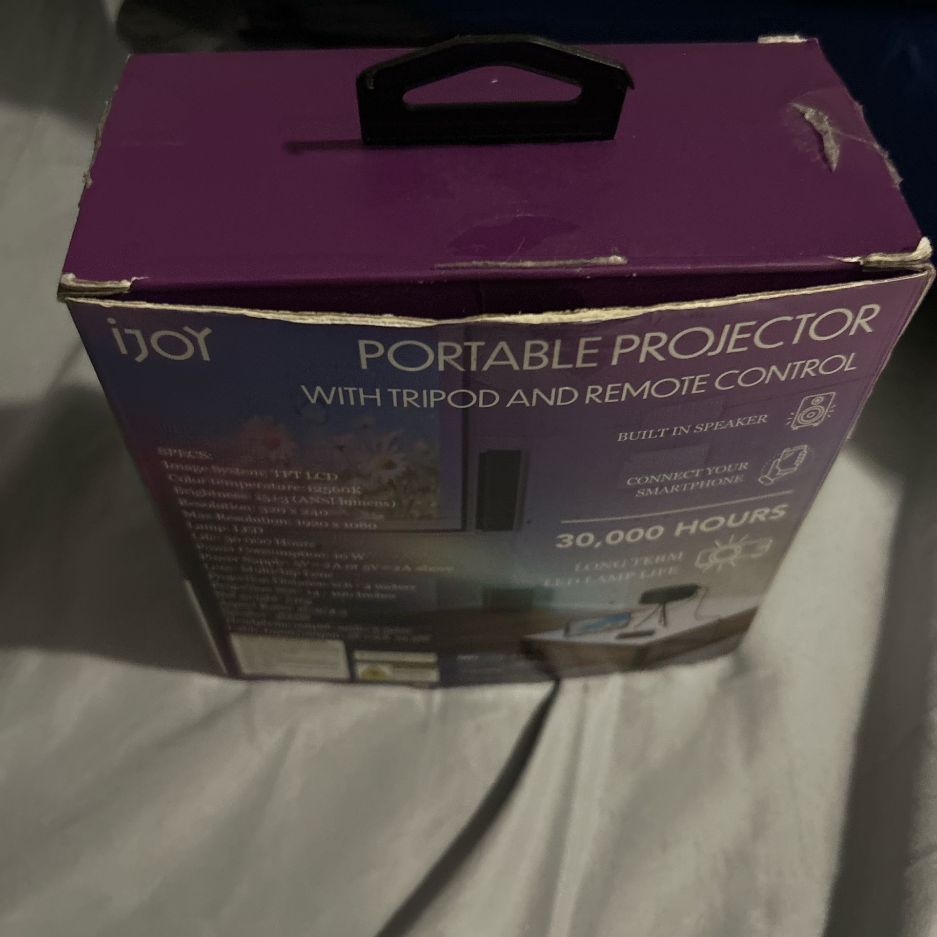 Purple portable projector with tripod and remote control #Projector #HomeTheater