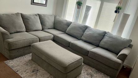 Light Grey 2 Piece Sectional With Ottoman