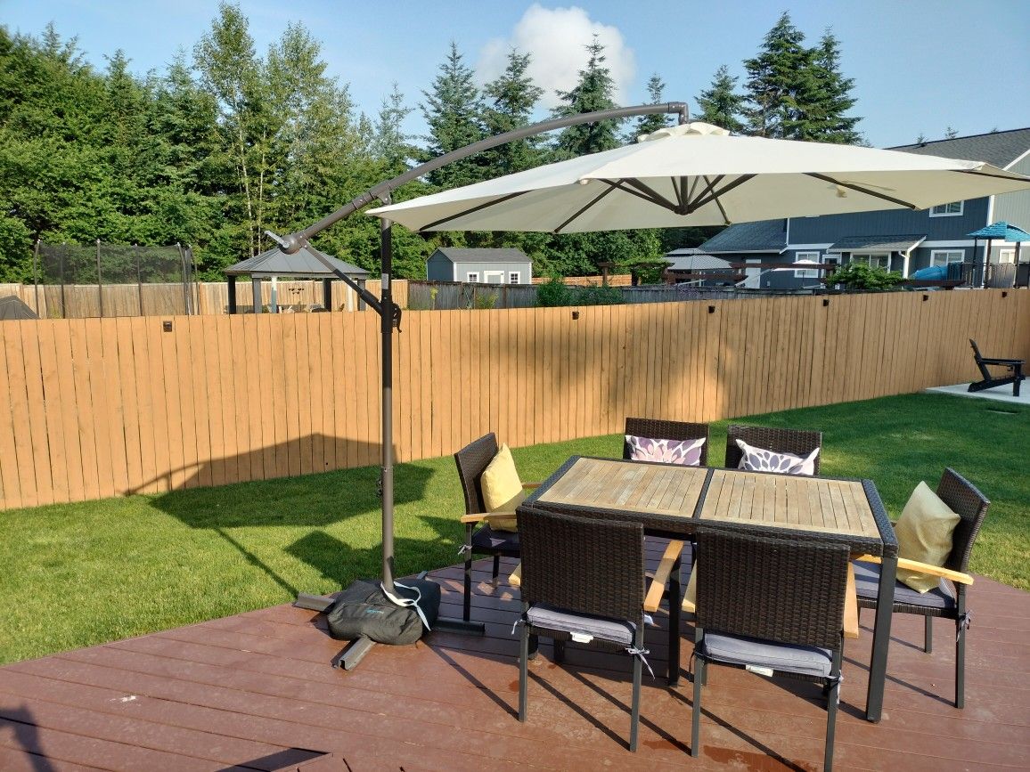 Outdoor Table, Chairs And Umbrella