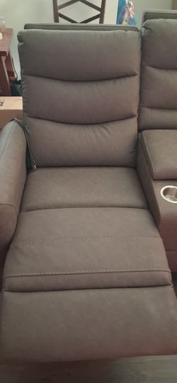 Brand new living spaces love seat recliner with electrical outlets