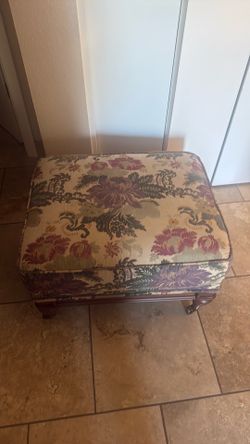 Antique rolling ottoman