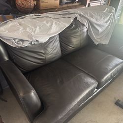 $180_2 leather black sofas
