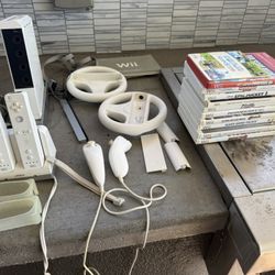 Wii Nintendo Gaming System And 11 Games. 
