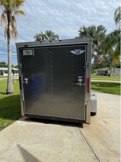 7‘ x 7‘ x 12‘ cargo trailer with ramp inside door