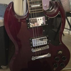Gibson SG styled electric guitar with Amp Silvertone by Samick