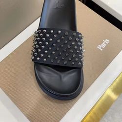 Christian Louboutin  red bottom slides