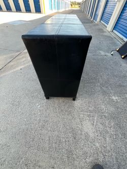 Beautiful leather clad chest of drawers $74