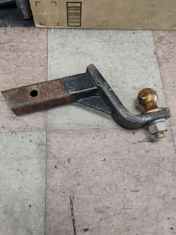 Used drop hitch designed for a 2-inch receiver, featuring a 2-inch trailer ball.