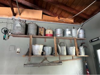 Antique watering cans