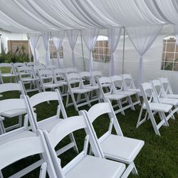 White Resin Chairs A Tent For Your Event !