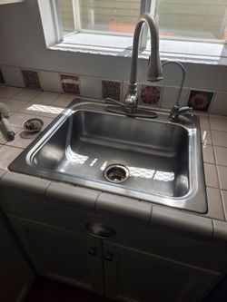 Kitchen sink - 25 inch wide stainless sink with faucet
