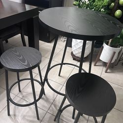 bar table and 2 stools