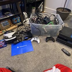 BOX OF VALUE. Two Xbox One And One S. PS4 VR Set Up. Games. Controllers. Net Gear 100 Dollar Modem And More 