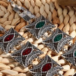 Cool and trendy men's stylish accessories featuring hip-hop style, gold chains with diamonds, Cuban chains, bracelets and necklaces, geometric element