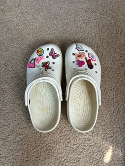 White crocs with bits