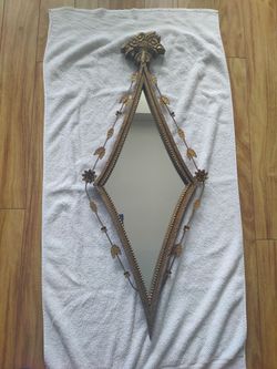 Diamond shaped gold mirror