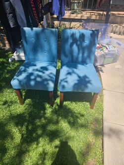 Two blue upholstered chairs in good condition!