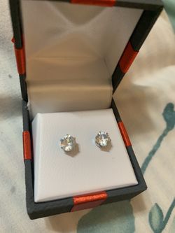 Zircon with silver studs
