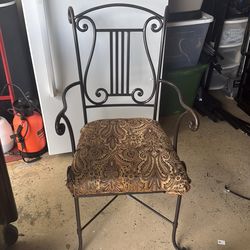 Iron chair size leg to seat is 18” and leg to the top 39”