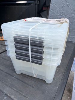 a set of plastic transparent storage boxes