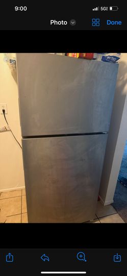 Stainless steel apartment size refrigerator