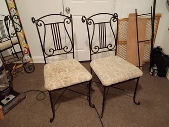 Two Solid Iron Chairs 