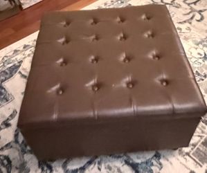 Brown leather ottoman