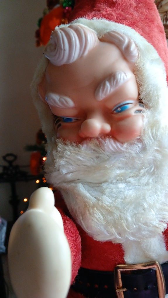 Santa Claus vintage Robert, standing standing holiday seasonal Christmas.